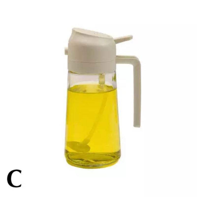 2-In-1 glass oil sprayer and dispenser with white lid and handle, 450ml capacity.